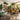 A modern spa salon featuring sustainable furniture including bamboo side tables and chairs with recycled plastic elements in a serene, natural setting