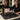 A professional heat mat for styling stations protecting a salon countertop from hot styling tools