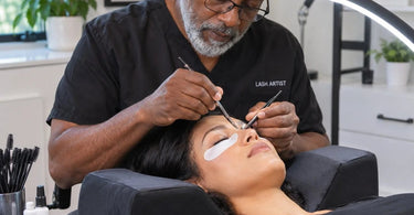 Ergonomic memory foam lash pillow with U-shaped contour and side tool pockets for client comfort during eyelash extension appointments
