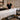 A luxurious Custom Craftworks Deluxe Table Warmer on a massage table, providing seasonal comfort for spa and salon clients.