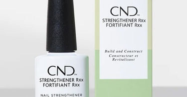 CND Nail Strengthener RXx bottle shown with professional nail tools