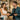 A beauty influencer and a licensed spa professional collaborate, examining high-quality professional wax and skincare products on a clean, well-organized salon station