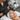 Esthetician carefully applying lash tint to a client with professional tools and supplies