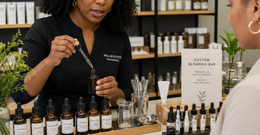 Professional aromatherapy blending bar setup with essential oils and mixing tools at Pure Spa Direct
