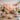 A beautifully designed salon feature wall with textured panels, a neon sign, and stylish shelves displaying professional beauty products, creating an inviting and Instagram-worthy focal point.