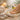 A serene spa pedicure setup featuring plush white towels, ambient lighting, aromatic scents, and professional product rituals for a luxurious yet budget-friendly experience.