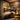 A serene and peaceful treatment room in a busy salon designed as a sensory deprivation zone, featuring soft lighting, a luxurious massage table, and calming decor to promote relaxation and client bliss.