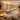 Serene sound bath room setup featuring acoustic wall panels, comfortable floor loungers, and ambient lighting for a professional spa wellness experience