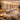 Serene sound bath room setup featuring acoustic wall panels, comfortable floor loungers, and ambient lighting for a professional spa wellness experience