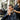 Spa professional addressing a client who appears unwell during an appointment
