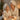 A mother and daughter sharing a joyful spa experience, smiling while receiving side-by-side facials