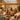 A modern, inviting unisex salon interior with a curved reception desk, warm wood accents, and comfortable lounge seating, designed to feel personal and stylish.