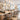 Modern and stylish blowout bar interior design featuring sleek black chairs, mirrors with built-in lighting, and a clean, comfortable atmosphere for a speedy salon service.
