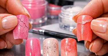 A professional nail technician performing a dip powder nail service on a client in a salon, showcasing the troubleshooting process for common dip powder issues like cracking and lifting.