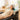 Woman receiving a luxurious hair spa treatment with foamy shampoo and relaxing scalp massage
