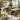 Eco-friendly salon disinfectant sprays and wipes on a clean spa counter with plants