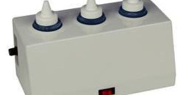 Electric Lotion Warmer Holds (3) 8 oz. 2" Diameter Bottles for professional spa, salon, and massage therapy use, keeping lotions and oils at the perfect temperature.