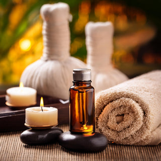 A collection of essential oils in a spa setting