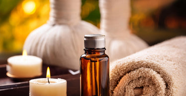 A collection of essential oils in a spa setting