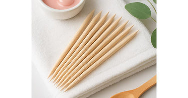 Birchwood sticks for waxing, brow shaping, and lash tinting in a professional spa setting