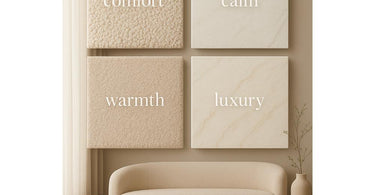 A detailed close-up of various luxurious spa textures including plush towels, smooth stones, woven baskets, and natural wood in a serene setting