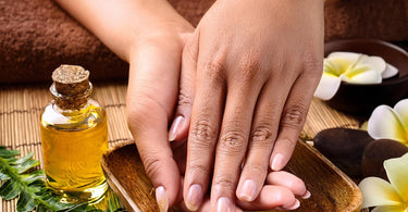 Healthy and strong female nails with oils and herbs
