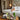 Luxury hotel spa amenities setup featuring robes, towels, and wellness products on a bed