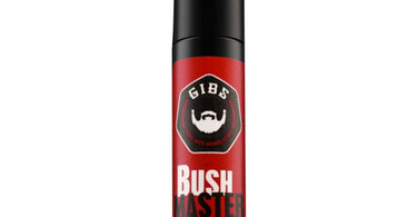 GIBS Bush Master Beard, Hair & Tattoo Oil bottle shown against professional salon background