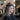 Gray-haired woman with gorgeous curls after a professional perm