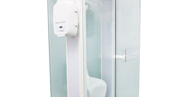 Modern HALOBOOTH PRO Dry Salt Therapy Booth in a serene spa setting, showcasing its sleek design and ambient interior lighting.