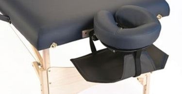 EarthLite Hanging Arm Sling attached to a massage table