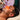 High frequency facial treatment using a glass wand on a client's skin