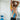 A therapist using kinesiology techniques to assess a client's muscle movement and alignment