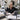 Spa professional organizing a vendor order calendar with beauty supplies and scheduling tools
