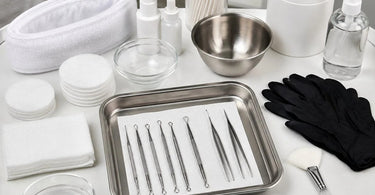 Professional Facial Extraction Supply Kit featuring stainless steel comedone extractors, lancets, and esthetic tools neatly organized in a case.