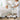 A stable facial steamer stand with a wide base and locking wheels, preventing tipping during professional spa treatments