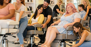 A modern, beige styling chair in a bright salon, highlighting its comfortable design and sturdy base suitable for clients of all sizes.