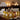 A serene spa setting with massage oils, candles, and towels arranged for a relaxing experience.