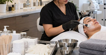 Professional spa and salon supplies arranged to compare single-use and reusable service essentials