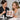 A professional aesthetician carefully applying corrective brow tint with a precision brush to achieve perfect symmetry without causing skin irritation.