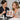 A professional aesthetician carefully applying corrective brow tint with a precision brush to achieve perfect symmetry without causing skin irritation.