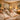 Serene spa treatment room with soft lighting and natural elements, designed to encourage a phone-free, relaxing environment for clients.