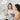 Esthetician consulting with a client on skincare routine