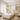 Beautifully designed bridal suite that doubles as a professional spa treatment room featuring a massage table, facial steamer, and elegant decor.