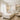 Beautifully designed bridal suite that doubles as a professional spa treatment room featuring a massage table, facial steamer, and elegant decor.