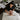 Spa professional performing a signature facial on a male client, focusing on his specific skin concerns.