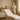 Spa professional assisting client who fainted during facial treatment