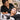 Professional lash and brow technician working carefully near a client's eyes during a salon beauty treatment, illustrating safe head positioning and client communication