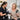 Close up of a professional esthetician carefully applying eyebrow tint to a client with alopecia areata.