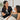 Spa professional introducing a new skincare tool to a relaxed client, emphasizing trust and a positive experience.